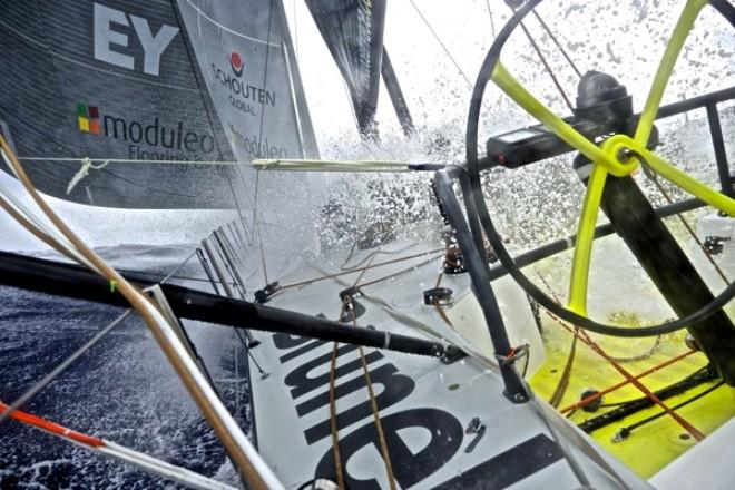 Team Brunel - A wave pours over the deck - Volvo Ocean Race 2014-15 © Stefan Coppers/Team Brunel